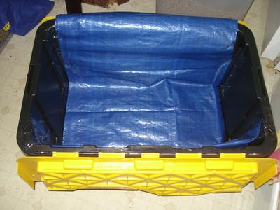 I lined the bin with a tarp because of the grooves in the bottom